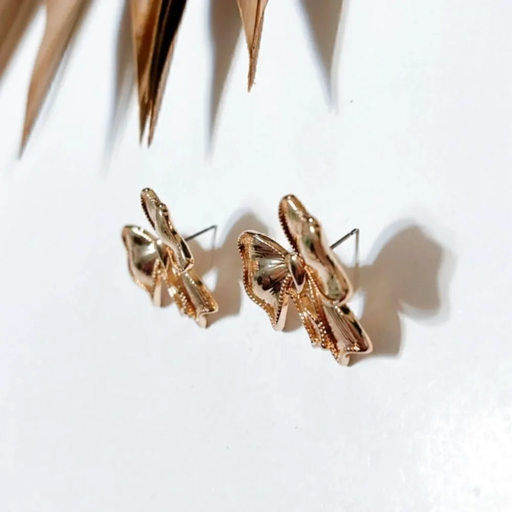 Gold bow stud earrings #794